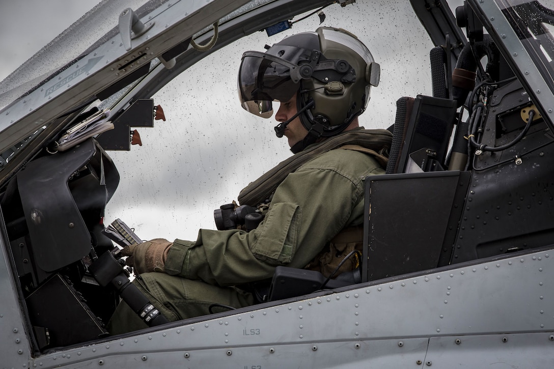 U.S. Marine Corps Capt. William Nutting, pilot, Marine Aircraft Group 24, operates an AH-1Z helicopter aboard Marine Corps Air Station, Kaneohe Bay, Hawaii, Dec. 19, 2017. The arrival of the 4th generation attack helicopters enhances the capabilities and power projection of Marine Light Attack Helicopter Squadron 367, Marine Aircraft Group 24, 1st Marine Aircraft Wing and MCBH. (U.S. Marine Corps Photo by Sgt. Alex Kouns)