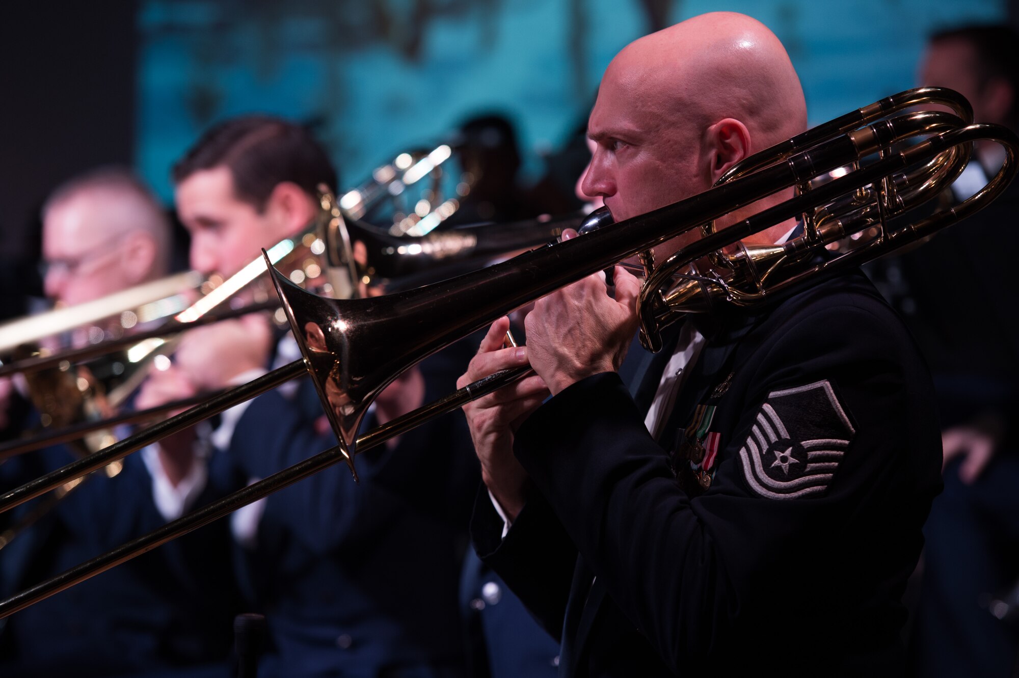 U.S. Air Force Master Sgt. Jason Foster, U.S. Air Force Heritage of America Band trombonist, performs during the Holiday Memories in Blue concert at Tabb High School in Yorktown, Va., Dec. 6, 2017.
