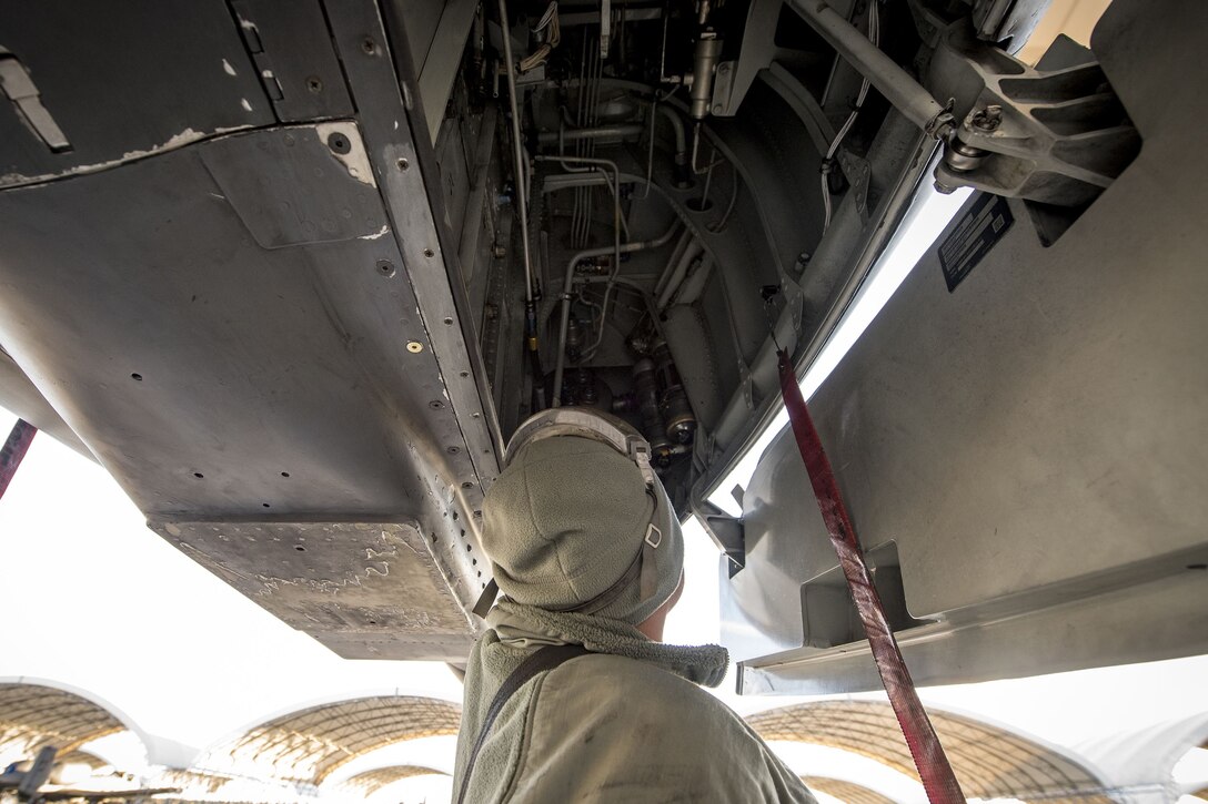 Senior Airman Carlos Ramon-Cruz, 75th Aircraft Maintenance Unit crew chief, inspects the landing gear of an A-10C Thunderbolt II, Jan. 5, 2018, at Moody Air Force Base, Ga. Team Moody resumed its flying operations after a Jan. 3 snow storm halted all maintenance and flying operations. (U.S. Air Force photo by Airman Eugene Oliver)