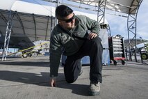 Senior Airman Carlos Ramon-Cruz, 75th Aircraft Maintenance Unit crew chief, performs a foreign object debris check, Jan. 5, 2018, at Moody Air Force Base, Ga. Team Moody resumed its flying operations after a Jan. 3 snow storm halted all maintenance and flying operations. (U.S. Air Force photo by Airman Eugene Oliver)