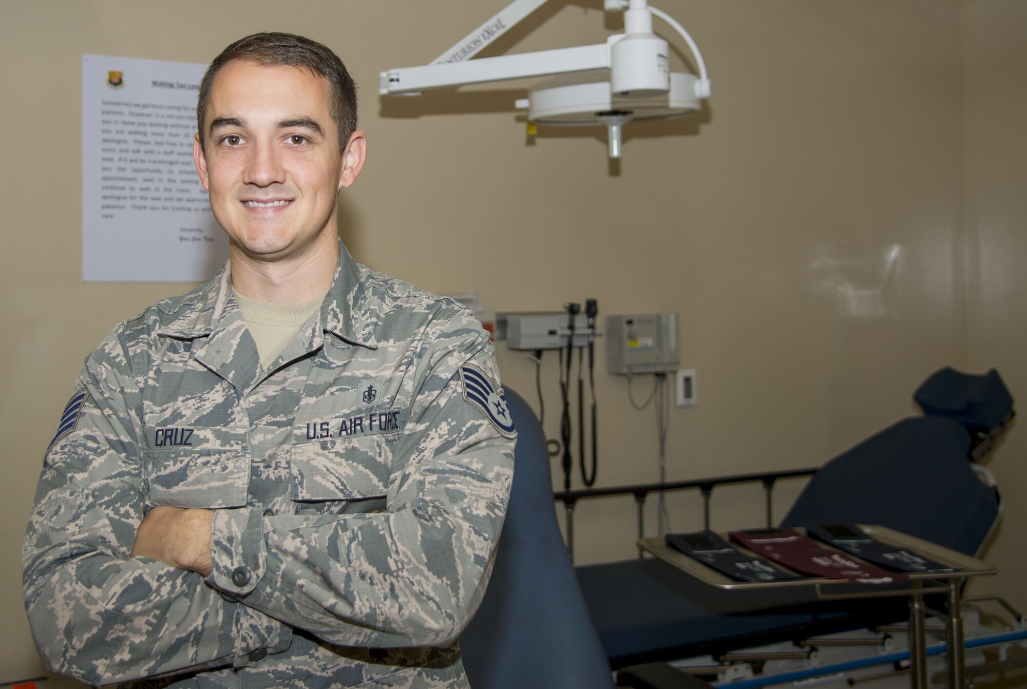 Staff Sgt. Brandon Cruz, an aerospace medical technician assigned to the 6th Medical Operations Squadron, pauses for a photo in the 6th Medical Group Clinic at MacDill Air Force Base, Fla., Dec. 21, 2017. Cruz provided lifesaving medical care to a young boy at the scene of an accident, Nov. 22, 2017. (U.S. Air Force photo by Senior Airman Mariette Adams)