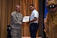 U.S. Air Force Col. Alex Ganster, 17th Training Group commander, presents the 315th Training Squadron Officer Student of the Month award for Dec. 2017 to 2nd Lt. Rajeev Stephens, 315th TRS trainee, in the base theater on Goodfellow Air Force Base, Texas, Jan. 5, 2018. The 315th Training Squadron’s mission is to train, educate and mentor our future intelligence, surveillance and reconnaissance warriors through innovation. (U.S. Air Force photo by Airman 1st Class Seraiah Hines/Released)