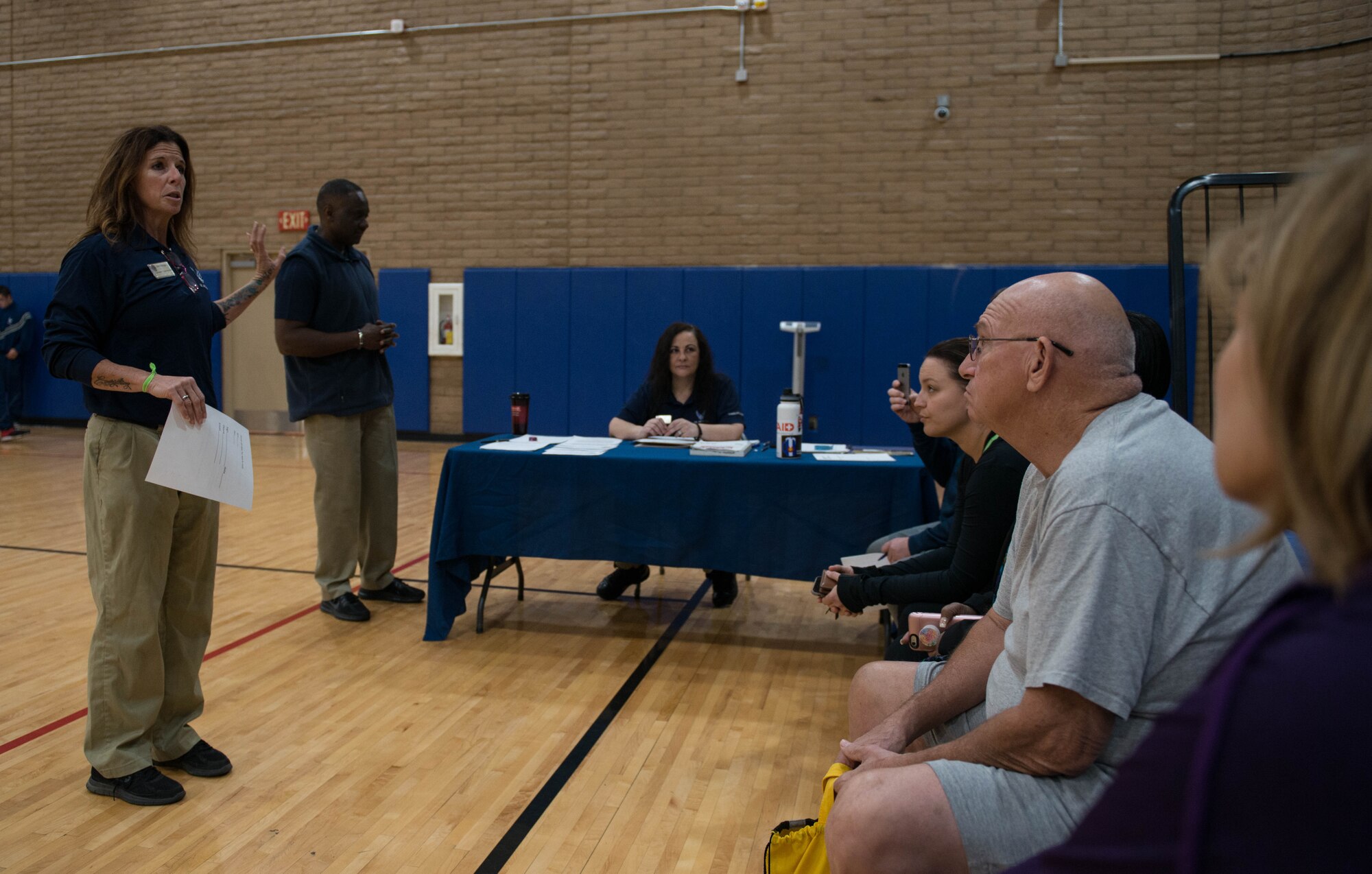 Sherri Biringer, 56th Force Support Squadron fitness specialist supervisor, speaks to participants during the in-processing brief of the “New Year, New You” Weight Loss Challenge in the Bryant Fitness Center at Luke Air Force Base, Ariz., Jan. 8, 2018. During the in-processing brief, participants received important contest rules and fitness information. (U.S. Air Force photo/Airman 1st Class Alexander Cook)