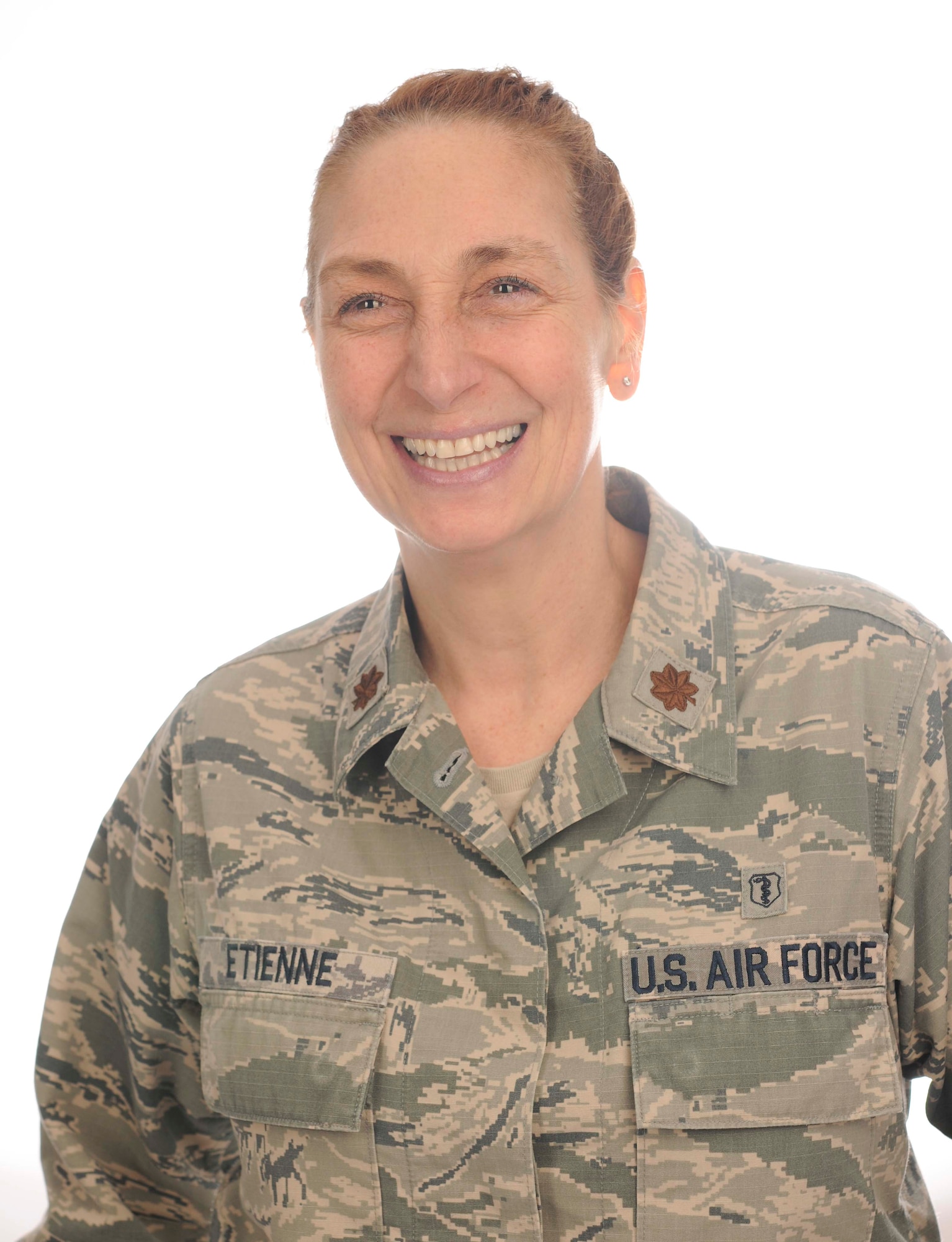 Maj. Neysa Etienne, 86th Medical Squadron flight commander and primary Survival, Evasion, Resistance, and Escape psychologist for U.S. Air Forces Europe and United States European Command, poses for a photo on Ramstein Air Base, Germany, Jan. 5, 2018. Etienne recently received the Department of Defense-wide Allied Health Leadership Excellence Award for senior clinician of the year, based on her work repatriating isolation victims. (U.S. Air Force photo by Senior Airman Elizabeth Baker)