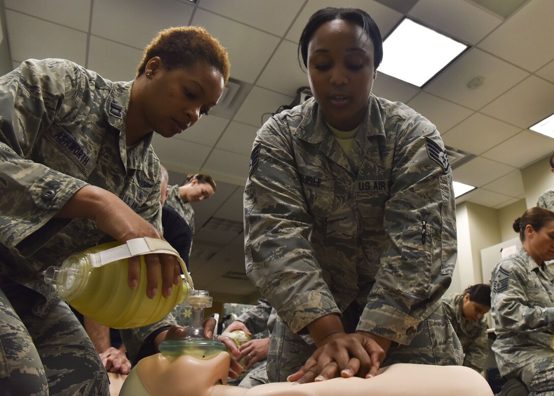 U.S. Air Force Airmen practice artificial ventilation during a Basic Life Support training hosted by the 633rd Medical Group Education and Training Center at Joint Base Langley-Eustis, Va., Dec. 6, 2017.