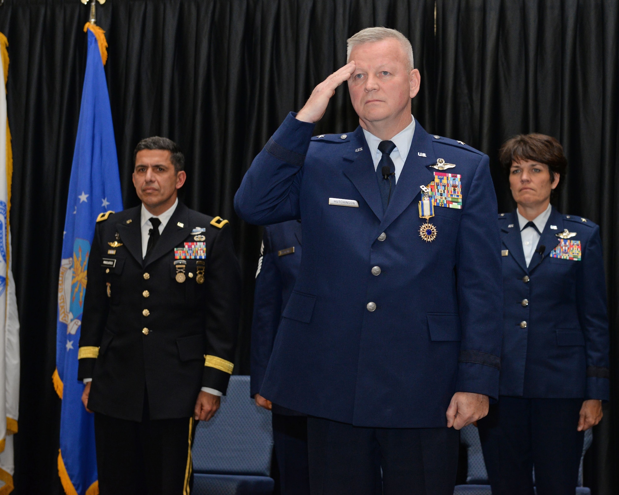 Brig. Gen. Paul N. Hutchinson, the commander New Hampshire Air National Guard renders a final salute during his retirement ceremony, at Pease Air National Guard Base, N.H., Jan. 6, 2017.  Hutchinson also served as the assistant adjutant general-air, New Hampshire ANG.  (N.H. Air National Guard photo by Staff Sgt. Curtis J. Lenz)