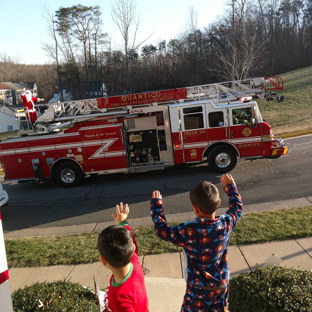 Community Support during the holidays is what makes this Base great. Firefighters from Security Battalion doing Santa visits to all the Base Neighborhoods.