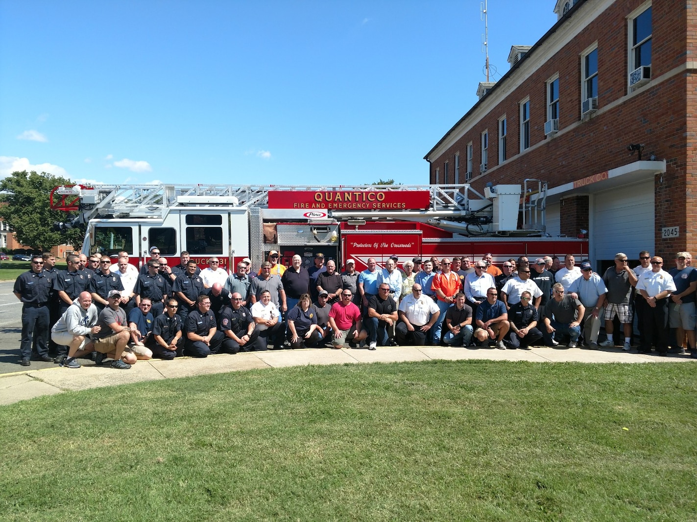 Posing are past and present Firefighters of Marine Corps Base Quantico as they celebrate there 100 years of support to MCB Quantico. September 8, 2017.