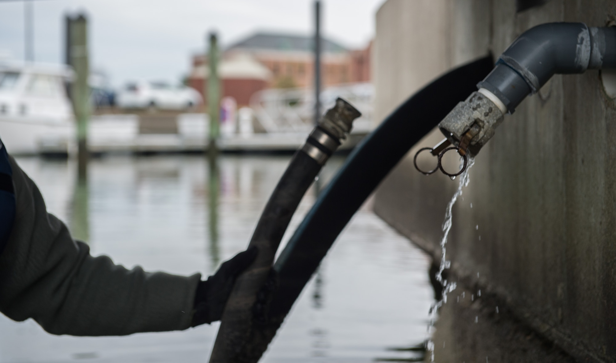 U.S. Air Force Airman 1st Class Tyler Talbot, 633rd Civil Engineer Squadron water and fuel systems maintenance journeyman, detaches a water pipe at Joint Base Langley-Eustis, Va., Dec. 7, 2017.