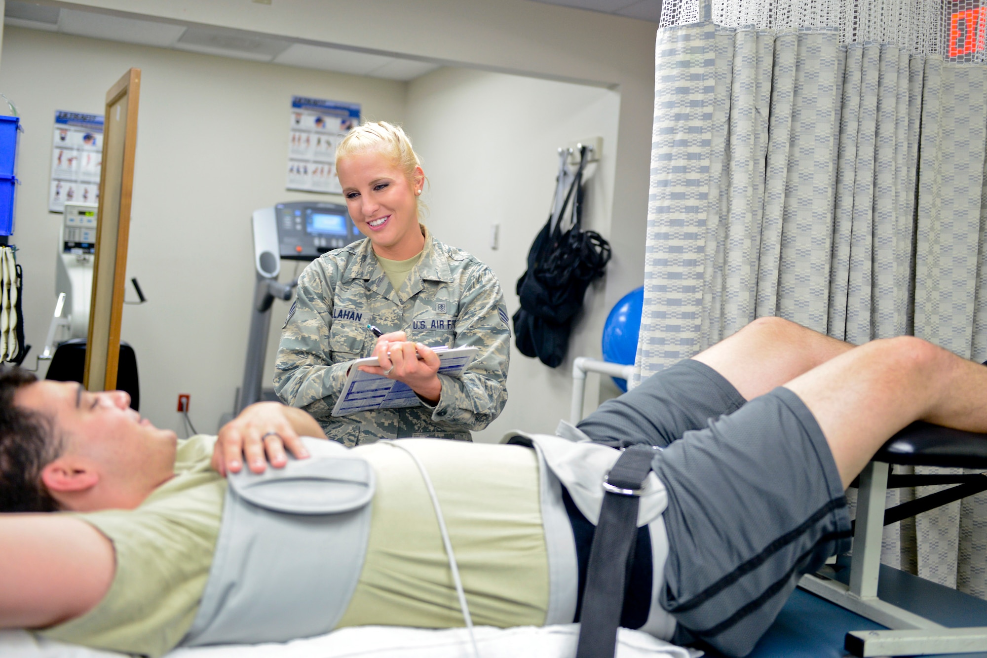 Senior Airman Kaitlyn Callahan, 341st Medical Operations Squadron physical therapy technician, assists an Airman Aug. 12, 2017, at Malmstrom Air Force Base, Mont.