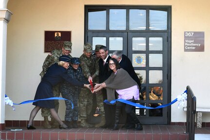 Military, community and family members cut the ribbon to officially open the Vogel Resiliency Center Jan. 5. Pictured, from left, are Air Force Brig. Gen. Heather Pringle, commander, 502nd Air Base and Joint Base San Antonio; Army Brig. Gen. Jeffrey Johnson, commander, Brooke Army Medical Center; Rear Adm. Rebecca McCormick-Boyle, commander, Navy Medicine Education and Training Command; Army Lt. Gen. Jeffrey S. Buchanan, commander, U.S. Army North (Fifth Army): Army Lt. Gen. Nadja West, U.S. Army Surgeon General and commander, US. Army Medicine; San Antonio Mayor Ron Nirenberg, Sue Orosz, and Acting Assistant of the Army for Manpower and Reserve Affairs Raymond Horoho. The Vogel Resiliency Center brings together eight entities of resiliency services to one location. This facility is unique to Joint Base San Antonio-Fort Sam Houston and unique in the Army. The Vogel Resiliency Center is in building 367 located at the corner of Stanley and Reynolds Roads.
