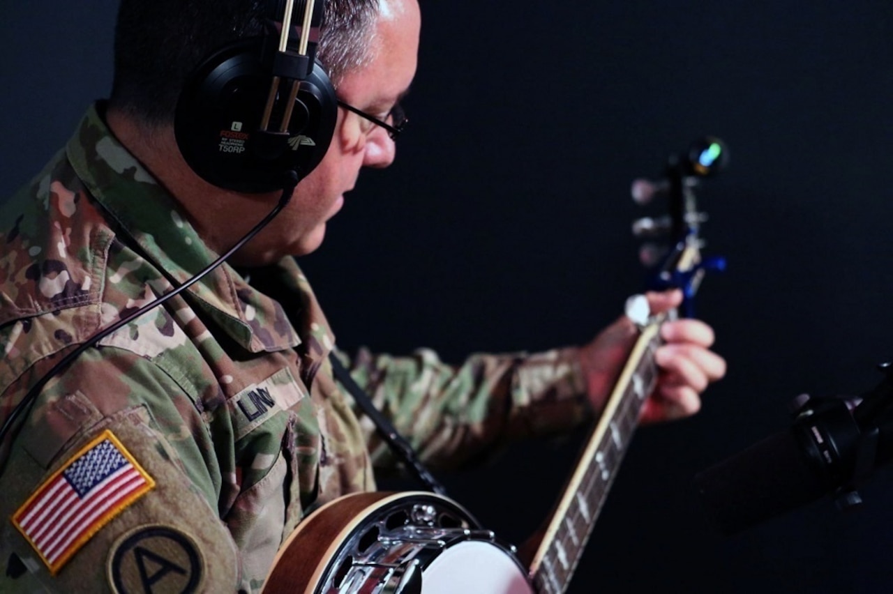 Army Sgt. 1st Class Thomas Lindsey from the Army Field Band’s Six-String Soldiers prepares for a recording session at Fame Studios in Muscle Shoals, Ala.