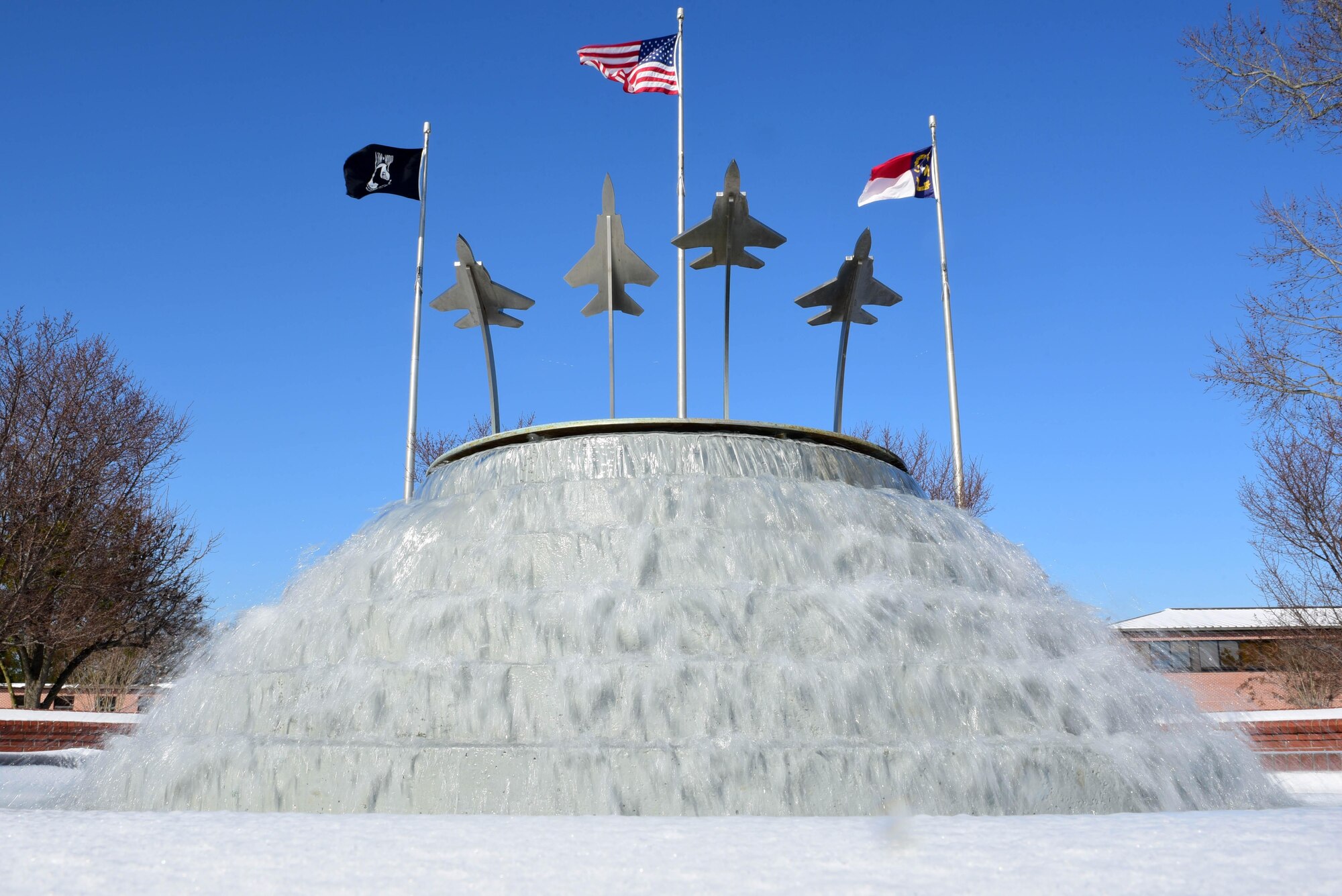 The ‘Missing Man’ formation memorial fountain in Heritage Park Jan. 4, 2018, at Seymour Johnson Air Force Base, North Carolina. The fountain was dedicated to commemorate the heroes of the base’s past. (U.S. Air Force photo by Airman 1st Class Victoria Boyton)