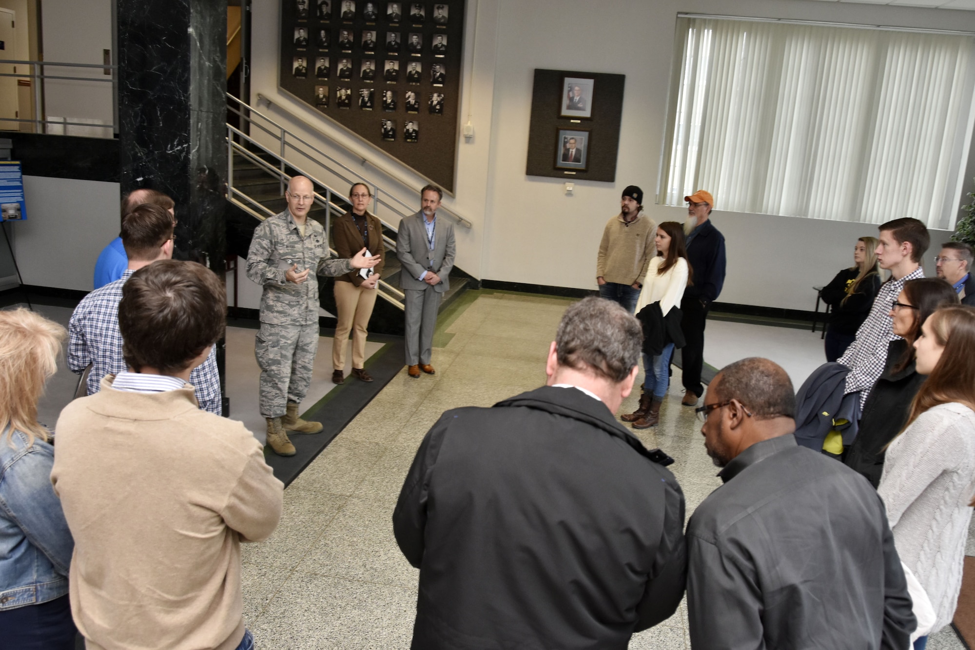 Col. Raymond Briggs, pictured in center left, welcomes the Bridge to the Future participants to Arnold Air Force Base. The event, for college-aged students of AEDC team members, was held Dec. 18 at Arnold to give prospective AEDC team members a chance to learn about the Complex and the career opportunities available. (U.S. Air Force photo/Rick Goodfriend)