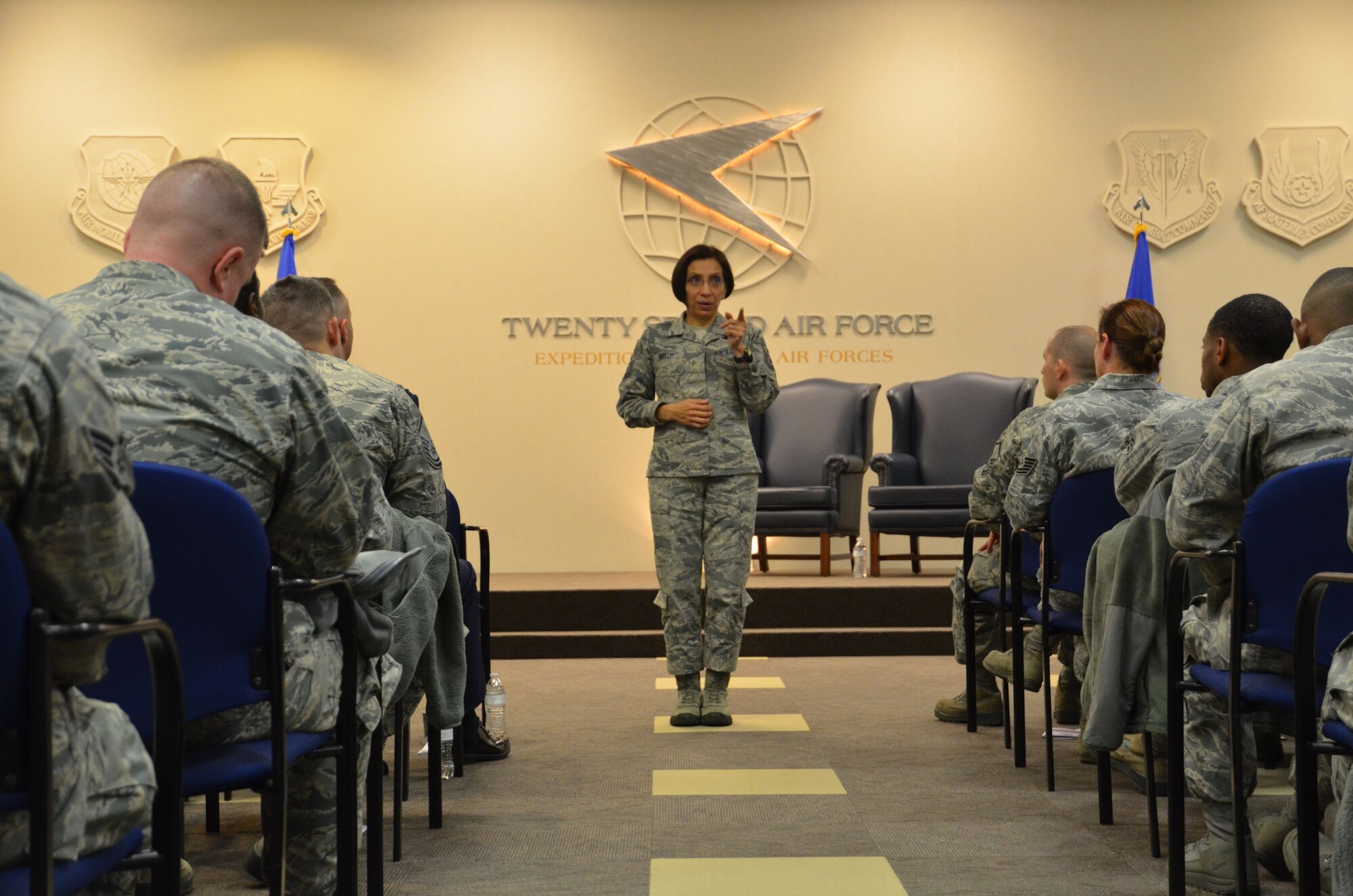 Chief Master Sgt. Ericka Kelly, Air Force Reserve Command command chief master sergeant, speaks to a group of Airmen at Dobbins Air Reserve Base, Ga, Jan. 6, 2018. Kelly visited Dobbins to tour the base and visit the units, as well as host question and answer sessions. (U.S. Air Force photo by Senior Airman Lauren Douglas)