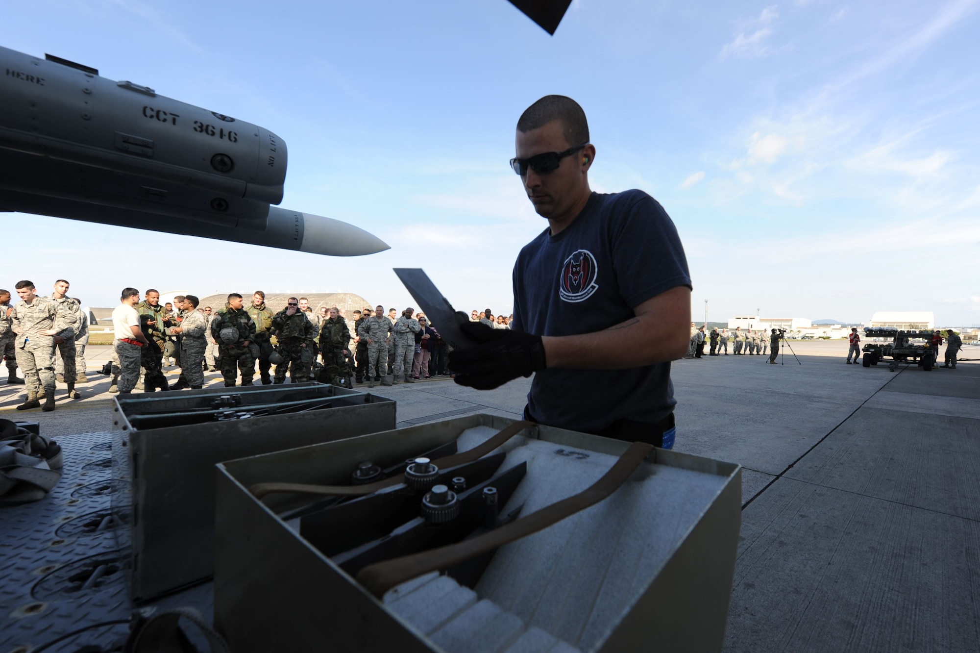 U.S. Air Force Chief Master Sgt. Daniel Taylor, 18th Maintenance Group superintendent, gives a victory speech after the Chiefs versus Eagles Weapons Load Competition Jan. 3, 2018, on Kadena Air Base, Japan. The competition pitted a team of chief master sergeants against a team of colonels on who could prepare the aircraft for combat the fastest with the fewest procedural errors. (U.S. Air Force photo by Staff Sgt. Micaiah Anthony)