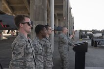 U.S. Air Force Tech. Sgt. Benjamin Bouvy, right, 18th Maintenance Group load standardization crew chief, introduces Airmen from the 67th Aircraft Maintenance Unit before an annual weapons load competition Jan. 3, 2018, on Kadena Air Base, Japan. Airmen from the 67th AMU competed against Airmen from the 44th AMU. (U.S. Air Force photo by Staff Sgt. Micaiah Anthony)