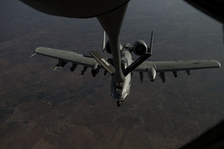 An A-10 Thunderbolt II refuels from a KC-135 Stratotanker.