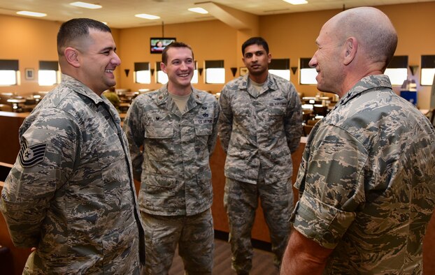 Gen. Mike Holmes, commander of Air Combat Command, speaks to Airmen selected as superior performers during his visit to Creech Air Force Base, Nev., Jan. 6, 2018. Holmes visited the Airmen of the 432nd Wing/432nd Air Expeditionary Wing to view Remotely Piloted Aircraft operations firsthand and to discuss the future of the enterprise. (U.S. Air Force photo/Senior Airman Christian Clausen)