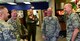 Gen. Mike Holmes, commander of Air Combat Command, laughs with Chief Master Sgt. Jamie Auger and leadership from the 432nd Wing/432nd Air Expeditionary Wing and the 99th Air Base Wing while visiting the facilities on his visit to Creech Air Force Base, Nev., Jan. 6, 2018. Holmes visited to discuss the future of the Remotely Piloted Aircraft enterprise. (U.S. Air Force photo/Senior Airman Christian Clausen)