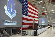 Col. Erik Peterson, commander of the Wisconsin Air National Guard's 115th Fighter Wing addresses unit members during the annual awards ceremony at Truax Field in Madison, Wisconsin, Jan. 6, 2017. The ceremony highlighted Airman from throughout the unit who displayed exemplary skill and leadership in the performance of their duties both at home, and in deployed locations around the world. (U.S. Air National Guard photo by Master Sgt. Paul Gorman)