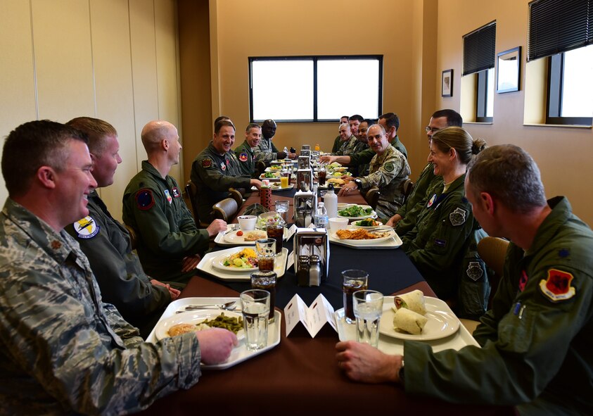 Lt. Gen. Jeffrey Harrigian, Air Forces Central Command commander, shares a laugh with Creech leadership Jan. 8, 2017, at Creech Air Force Base, Nev. Harrigian toured operational squadrons around the base to meet with remotely piloted aircraft Airmen. (U.S. Air Force photo/Senior Airman Christian Clausen)