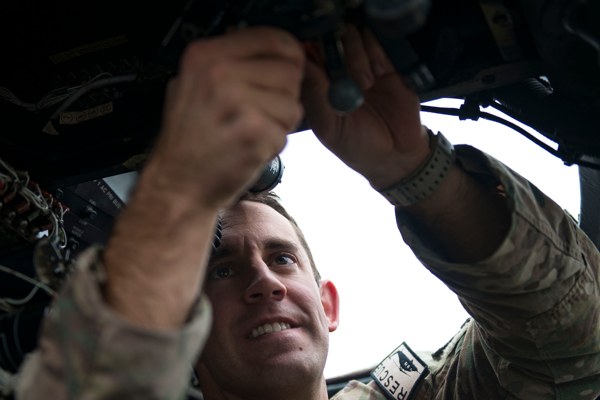 Staff Sgt. Jacob Schaake, 41st Helicopter Maintenance Unit (HMU) crew chief, adjusts a starter switch in an HH-60G Pave Hawk, Jan. 9, 2018, at Moody Air Force Base, Ga. The 41st HMU keeps Pave Hawks operationally ready by performing inspections and repairs on various components of the helicopter. Those efforts are critical in facilitating the mission of the 41st Rescue Squadron at Moody. (U.S. Air Force photo by Airman 1st Class Erick Requadt)