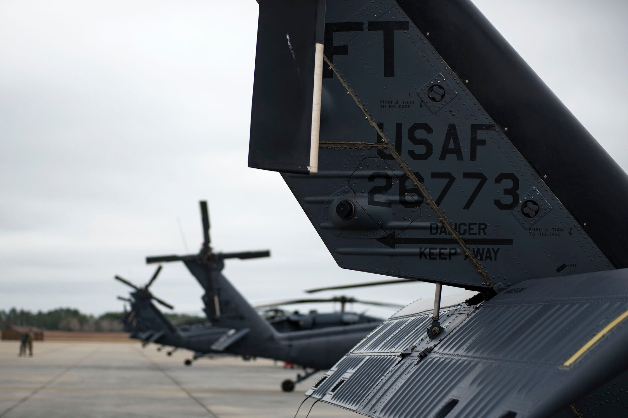 HH-60G Pave Hawks rest on the flight line, Jan. 9, 2018, at Moody Air Force Base, Ga. The 41st Helicopter Maintenance Unit keeps Pave Hawks operationally mission-ready by performing inspections and repairs on various components of the helicopter. Those efforts are critical in facilitating the mission of the 41st Rescue Squadron at Moody. (U.S. Air Force photo by Airman 1st Class Erick Requadt)