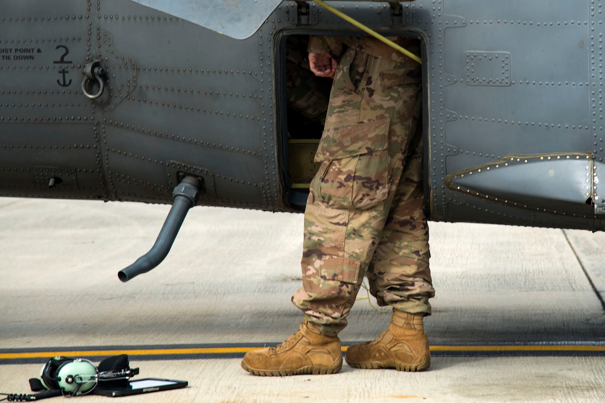 Senior Airman Kaiden Stanley, 41st Helicopter Maintenance Unit (HMU) specialist, reviews component locations in an HH-60G Pave Hawk, Jan. 9, 2018, at Moody Air Force Base, Ga. The 41st HMU keeps Pave Hawks operationally ready by performing inspections and repairs on various components of the helicopter. Those efforts are critical in facilitating the mission of the 41st Rescue Squadron at Moody. (U.S. Air Force photo by Airman 1st Class Erick Requadt)