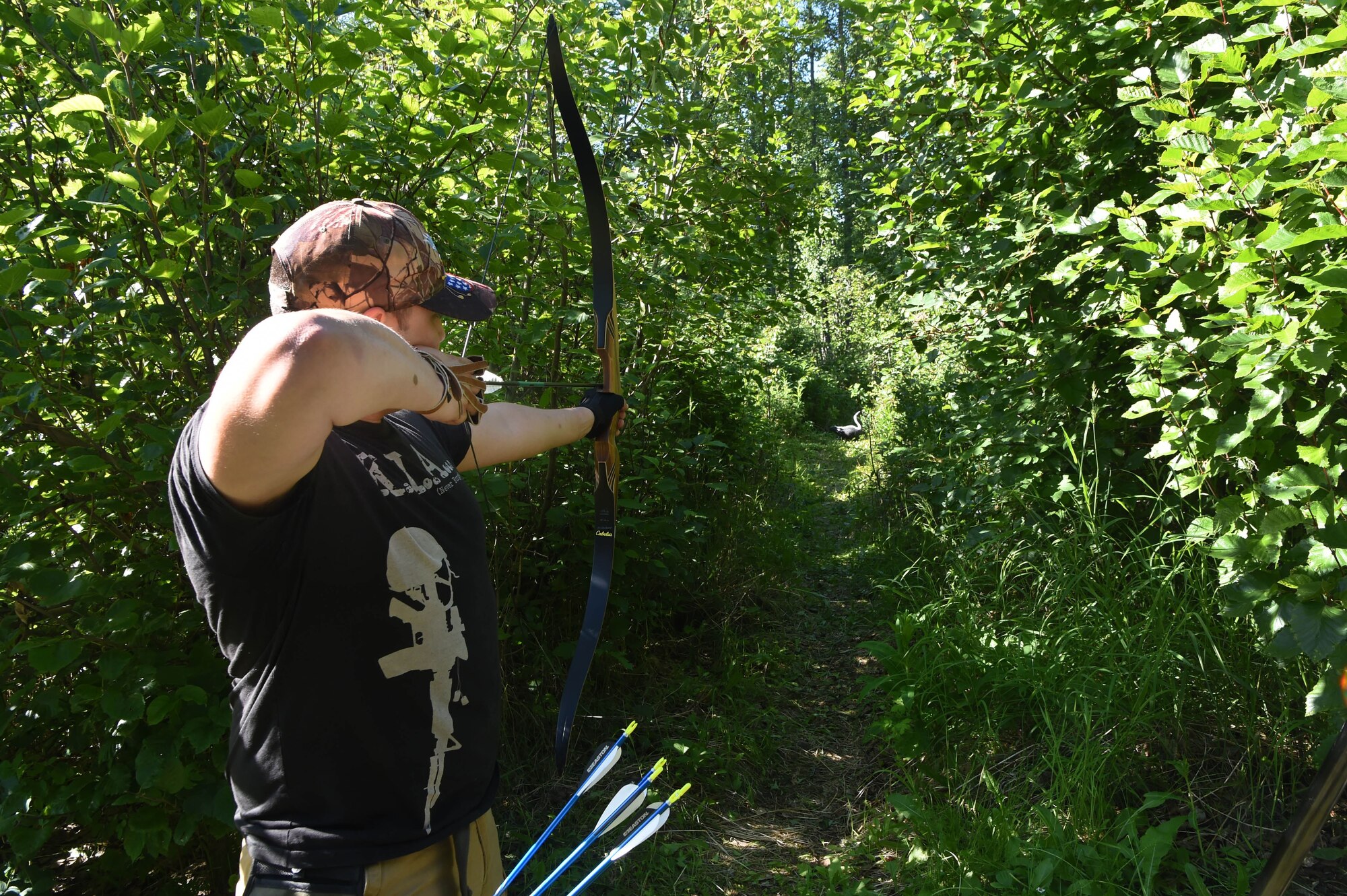 A service member uses undeveloped recreational areas for practicing archery at Joint Base Elmendorf-Richardson, Alaska June, 17 2016. Prior to any recreation on the base’s undeveloped areas, individuals 16 years and older must register in the iSportsman system.