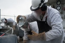 U.S. Air Force Tech. Sgt. Eric Fortenberry, 673d Logistics Readiness Squadron fuels facilities section technician, takes a sample of liquid oxygen at Joint Base Elmendorf-Richardson, Alaska, Dec. 4, 2017. Oxygen is pressurized and cooled into a liquid state in order to transport it more efficiently from cryogenic tanks to JBER’s aircraft to provide fresh air to pilots in flight.