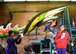 Volunteers apply finishing touches to the tail of the dragon featured in the UPS Store, Inc. float as part of the 2018 Rose Parade in Pasadena, Calif., Dec. 30, 2017. Every square inch of the floats that are exposed must be coved with flowers or other natural material, such as the grapefruit, oranges, lemons and limes used in the UPS Store, Inc. float. (U.S. Air Force photo by Staff Sgt. Danielle Quilla)