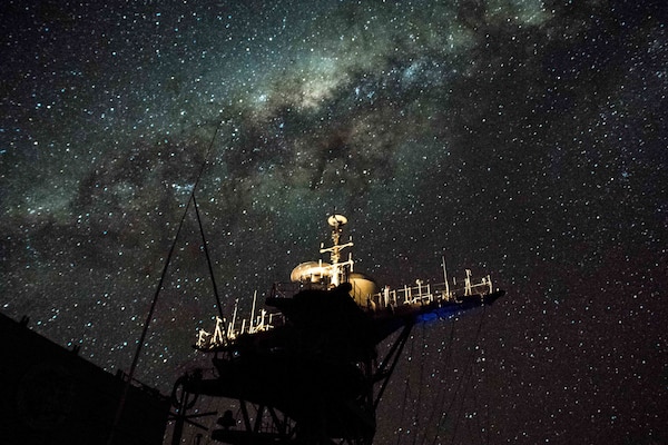 170721-N-UX013-703 CORAL SEA (July 21, 2017) The amphibious dock landing ship USS Ashland (LSD 48) patrols waters off the coast of Australia under a stars-lit night during Talisman Saber 17. Talisman Saber is a biennial U.S.-Australia bilateral exercise held off the coast of Australia meant to achieve interoperability and strengthen the U.S.-Australia alliance. (U.S. Navy photo by Mass Communication Specialist 3rd Class Jonathan Clay/Released)