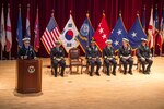 Busan, Republic of Korea (Jan. 11, 2018) Rear Adm. Michael E. Boyle speaks to Sailors and families during a change of command ceremony at Commander, U.S. Naval Forces Korea Headquarters. Boyle relieved Rear Adm. Brad Cooper, becoming CNFK’s 36th commander.