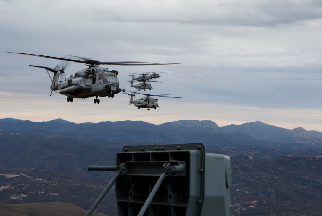 CH-53E Super Stallions with Marine Heavy Helicopter Squadron (HMH) 361 fly over San Diego, after launching from Marine Corps Air Station Miramar, Calif., Jan. 8. HMH-361 successfully launched eight CH-53Es for a single flight as a display of appreciation for the hard work of the squadron’s maintainers. Four aircraft returned to HMH-361, and the other four aircraft attached to Marine Medium Tiltrotor Squadron (VMM) 166 for an upcoming deployment with the 13th Marine Expeditionary Unit. (U.S. Marine Corps photo by Lance Cpl. Servando Morales/Released)