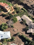 A California Air National Guard HH-60G Pave Hawk rescue helicopter with air crews and  two elite Guardian Angel pararescuemen from the 129th Rescue Wing Moffett Air National Guard Base, Calif, provide search and rescue operations in Southern California, impacted by a mudslides, Jan. 10, 2018.