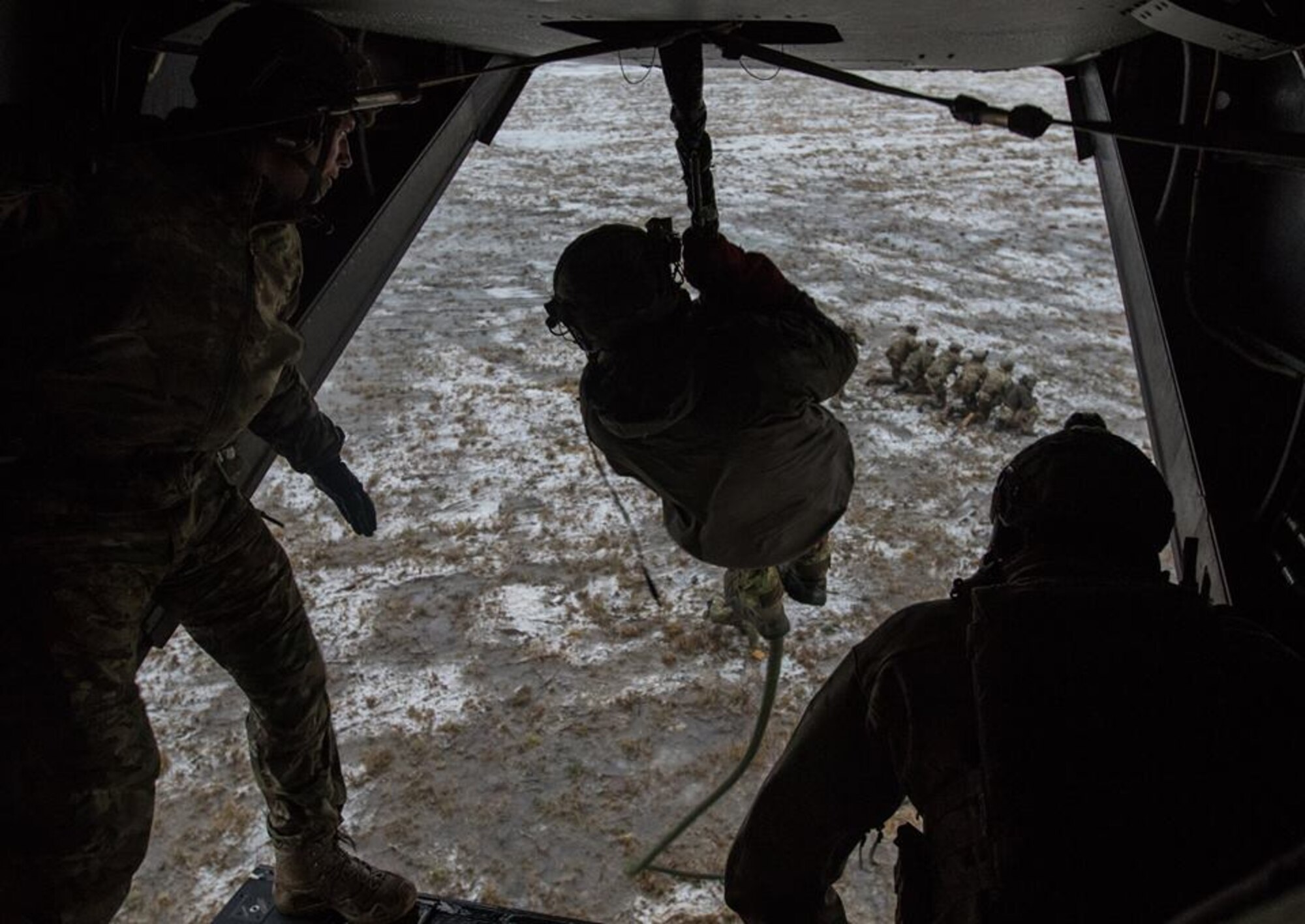Estonian and U.S. Special Operation Forces operators prepare to board a U.S. Air Force CV-22 Osprey, assigned to the 352d Special Operations Wing, during fast rope training near Amari, Estonia, Dec. 12, 2017. Estonian and U.S. SOF conducted Fast Rope Insertion and Extraction System training to build combined NATO SOF readiness.