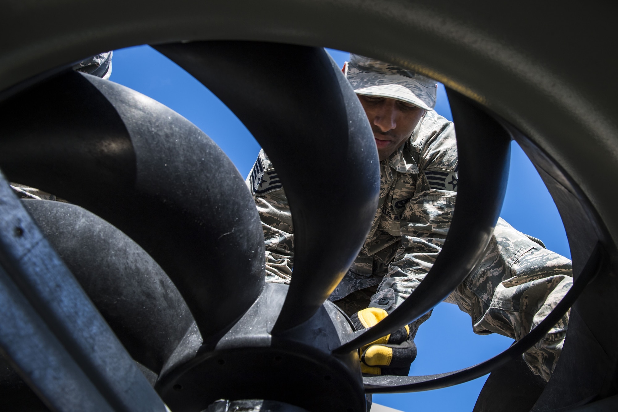 Staff Sgt. Zachary Pigg, 23d Civil Engineer Squadron Heating, Ventilation and Air Conditioning (HVAC) journeyman, ensured a fan is placed correctly, Jan. 10, 2018, at Moody Air Force Base, Ga. The equipment that keeps Moody comfortable indoors is designed for a climate that is typically warm year round, but when temperatures fall below 40 degrees, the equipment starts to malfunction. With temperatures recently dipping into the low teens and snow falling this winter for the first time since 2010, Airmen who work in Moody’s HVAC flight credit the weather for the busy winter they’re having. (U.S. Air Force photo by Senior Airman Janiqua P. Robinson)