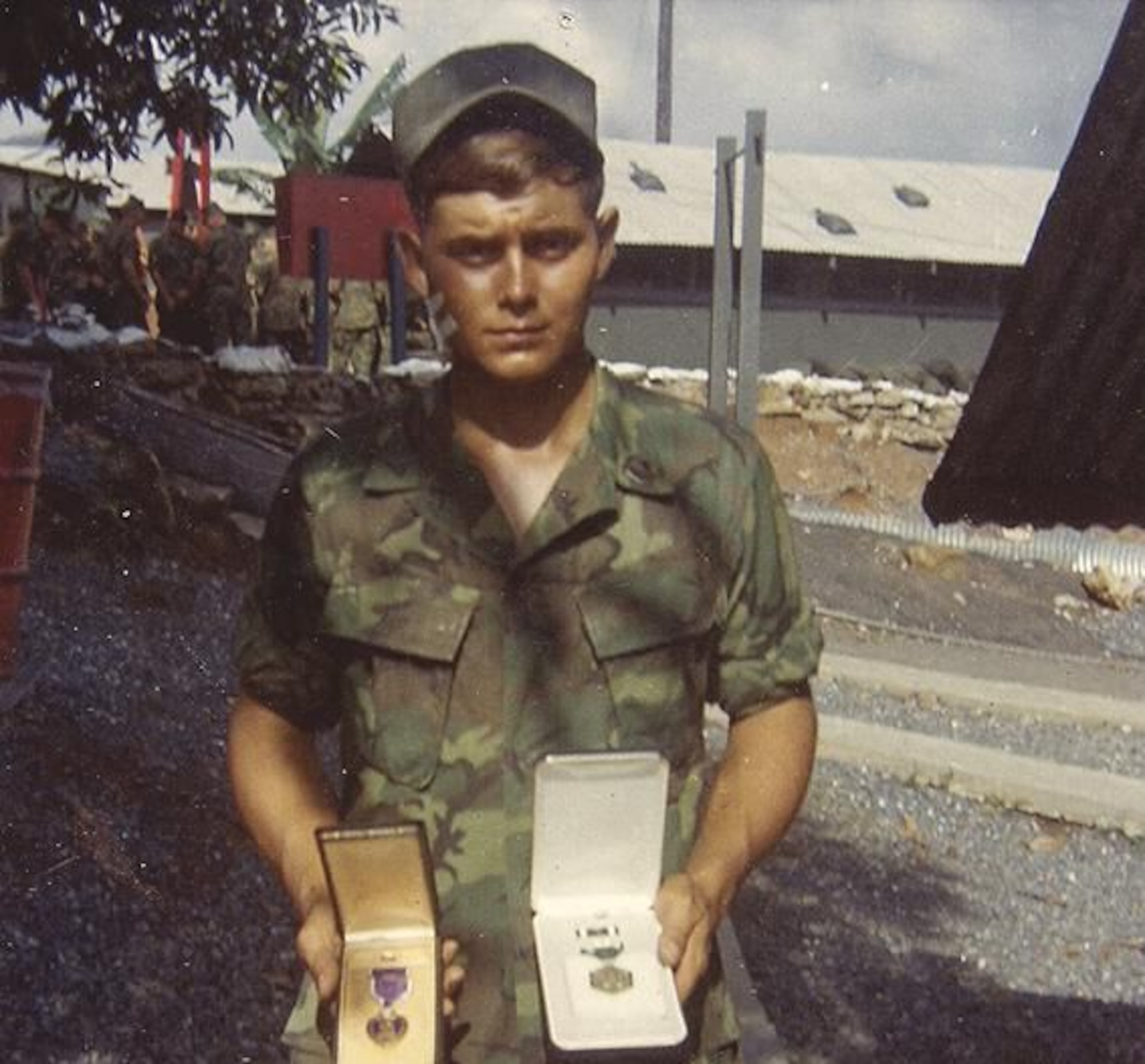 Navy corpsman Steve Vineyard displays the Purple Heart and Navy Commendation Medal he earned on July 30, 1969, while serving with the Marine 1st Reconnaissance Battalion in Quang Nam province. To train for his job in the war zone, Vineyard attended 16 weeks of Hospital Corps School, twice the time Army medics were provided. (Photo by Steve Vineyard)
