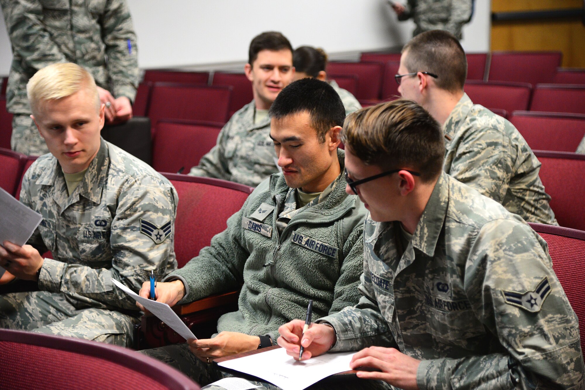 Participants of an Adaptive Flight Training Study complete a pre-study questionnaire Jan. 9, 2018, on Columbus Air Force Base, Mississippi. Over 30 participants were involved in the study, with 15 of those subjects wearing heart monitors to gather additional data. Researchers were at Columbus AFB for three days, with each participant flying for up to an hour, two days in a row. (U.S. Air Force photo by Airman 1st Class Keith Holcomb)