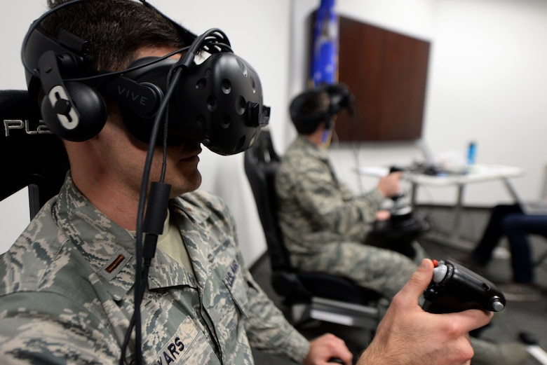 Second Lt. Kenneth Soyars, 14th Student Squadron student pilot, takes off during a virtual reality flight simulation Jan. 10, 2018, on Columbus Air Force Base, Mississippi. Two subjects flew at a time but no other subjects were allowed to watch or learn from other individuals’ sorties. The Adaptive Flight Training Study pushed subjects to learn through the VR technology. (U.S. Air Force photo by Airman 1st Class Keith Holcomb)