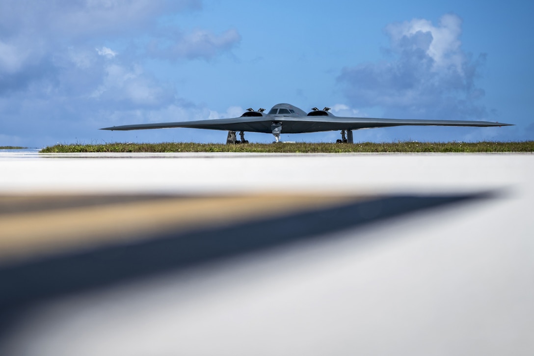 A B-2 aircraft taxis on a flightline.