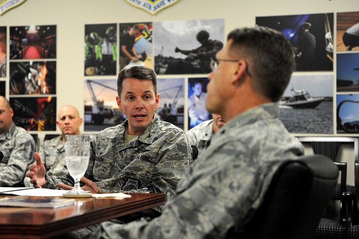 U.S. Air Force Col. Jeff W. Nelson, 628th Air Base Wing commander, provides a Joint Base Charleston mission brief to Brig. Gen. Steven J. Bleymaier, director of logistics, engineering and force protection, Headquarters Air Mobility Command, Scott Air Force Base, Ill, Jan. 9, 2018. Bleymaier visited JB Charleston to get a better understanding of joint operational capabilities and to meet with services members.