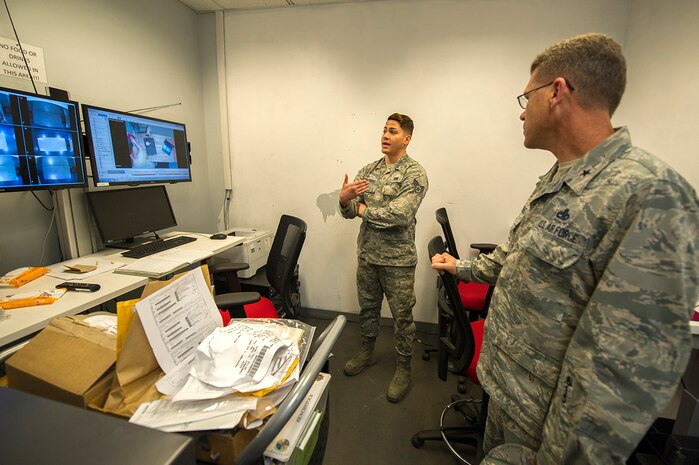 U.S. Air Force Senior Airman Angel Contreras, left, 437th Aircraft Maintenance Squadron consolidated tool kit custodian, briefs U.S. Air Force Brig. Gen. Steven J. Bleymaier, director of logistics, engineering and force protection, Headquarters Air Mobility Command, Scott Air Force Base, Ill at Joint Base Charleston, Jan. 10, 2018. Contreras highlighted the continuous process improvement tool inspection room which reduced wait time by 88 percent. This allows maintainers more time to keep Joint Base Charleston C-17s mission ready. General Bleymaier visited JB Charleston to get a better understanding of joint operational capabilities and to meet with services members.