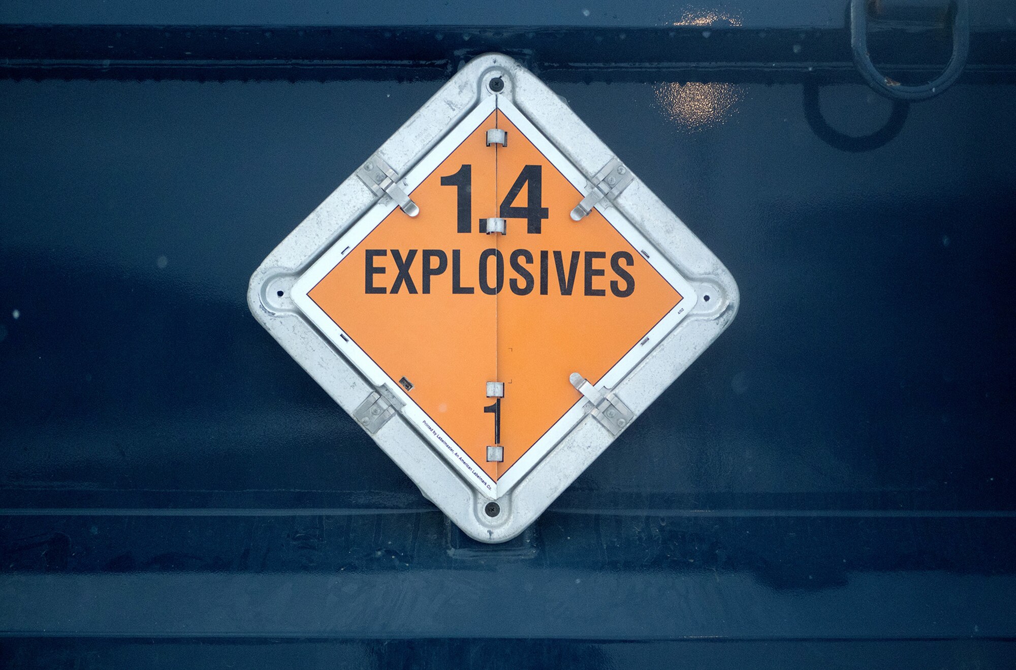 An explosives sign is seen on the side of a vehicle transporting ammunition for Airmen assigned to the 673d Security Forces Squadron conducting an M249 Squad Automatic Weapon, and M2 .50 Caliber machine gun qualification range on Joint Base Elmendorf-Richardson, Alaska, Jan. 10, 2018. Security Forces Airmen perform extensive training in law enforcement as well as combat tactics to protect U.S. Military bases and assets both stateside and overseas.