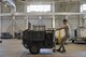 An Airmen with the 374th Maintenance Squadron aerospace ground equipment flight moves a piece of equipment, Jan. 10, 2018, at Yokota Air Base, Japan.