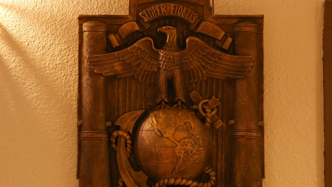 Claudio D’Augustino’s sculpture hangs on the wall of the Officers’ Club aboard the Marine Corps Air Ground Combat Center, Twentynine Palms, Calif., Jan. 9, 2018. The sculpture was donated to the Combat Center during a dedication ceremony to express D’Augustino’s appreciation for members of the armed services.