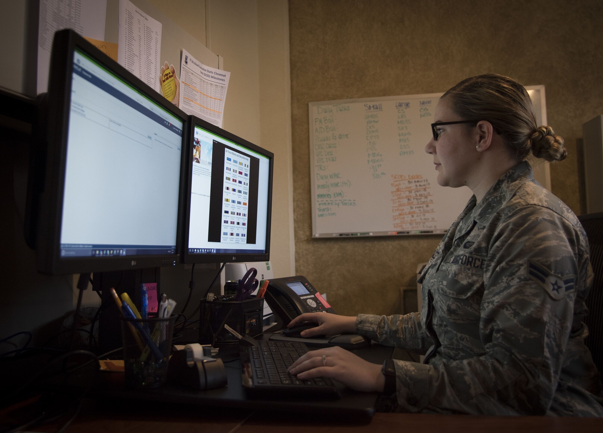 Airman 1st Class Kassandra Gonzalez, a force management technician assigned to the 6th Force Support Squadron, works on awards and decorations at MacDill Air Force Base, Fla., Jan. 10, 2018. The awards and decorations office assists military members on a variety of tasks from walk-in customers and email questions, to reviewing Case Management System cases and managing virtual personnel center for any pending evaluations and decorations. (U.S. Air Force photo by Senior Airman Mariette Adams)