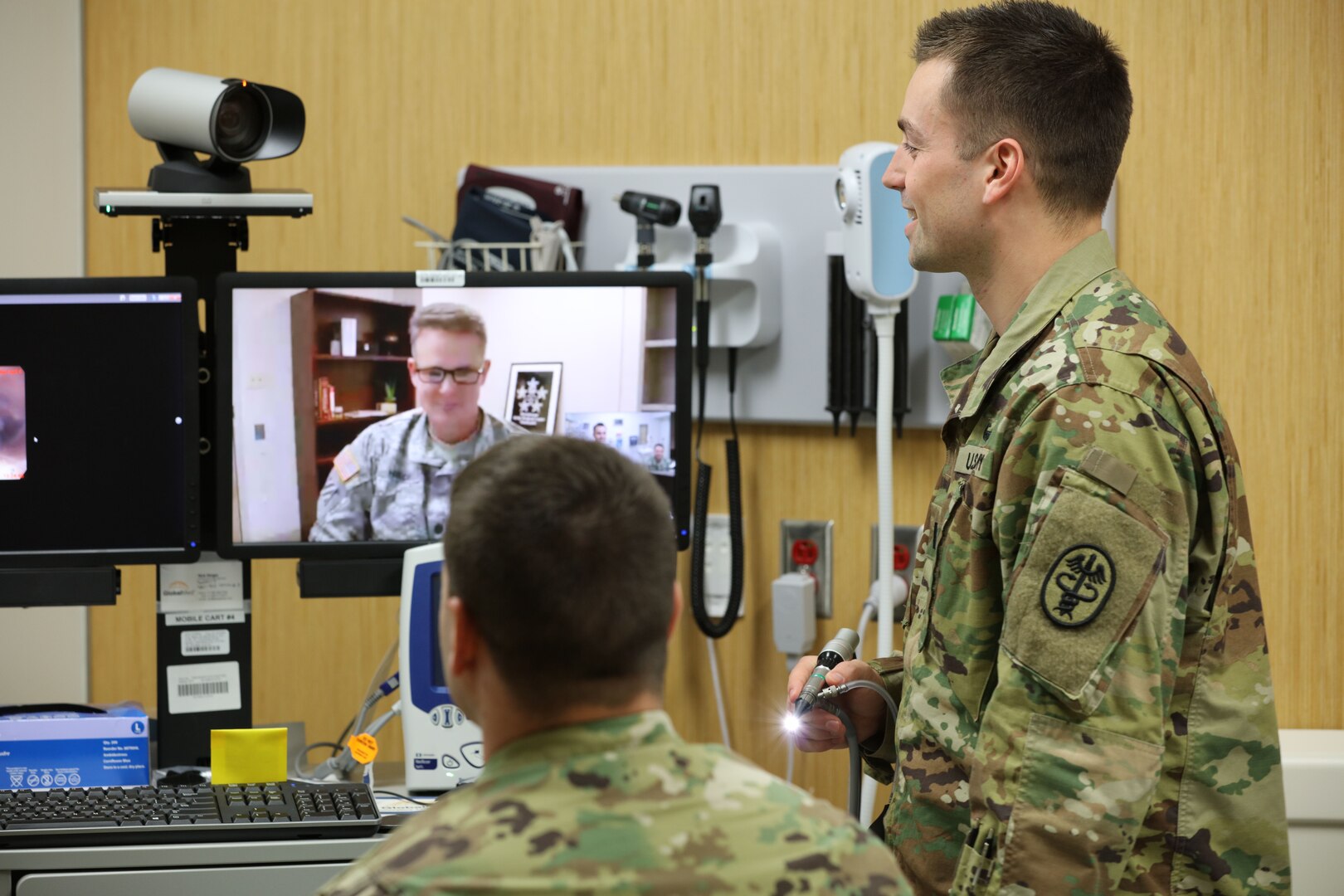 In a demonstration of the virtual health process, Lt. Col. Kevin A. Horde, a provider at Fort Gordon's Eisenhower Medical Center, offers remote consultation to mock patient Master Sgt. Jason H. Alexander with the nursing assistance of Lt. Maxx P. Mamula at Fort Campbell's Blanchfield Army Community Hospital. The Army recently opened a centralized virtual health medical center at Brooke Army Medical Center in Texas, Jan. 4, 2018.