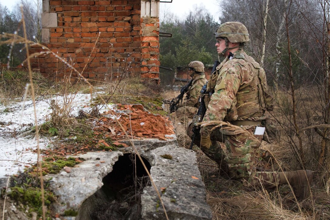 Soldiers provide security while fortifying a defensive position during Bull Run III.